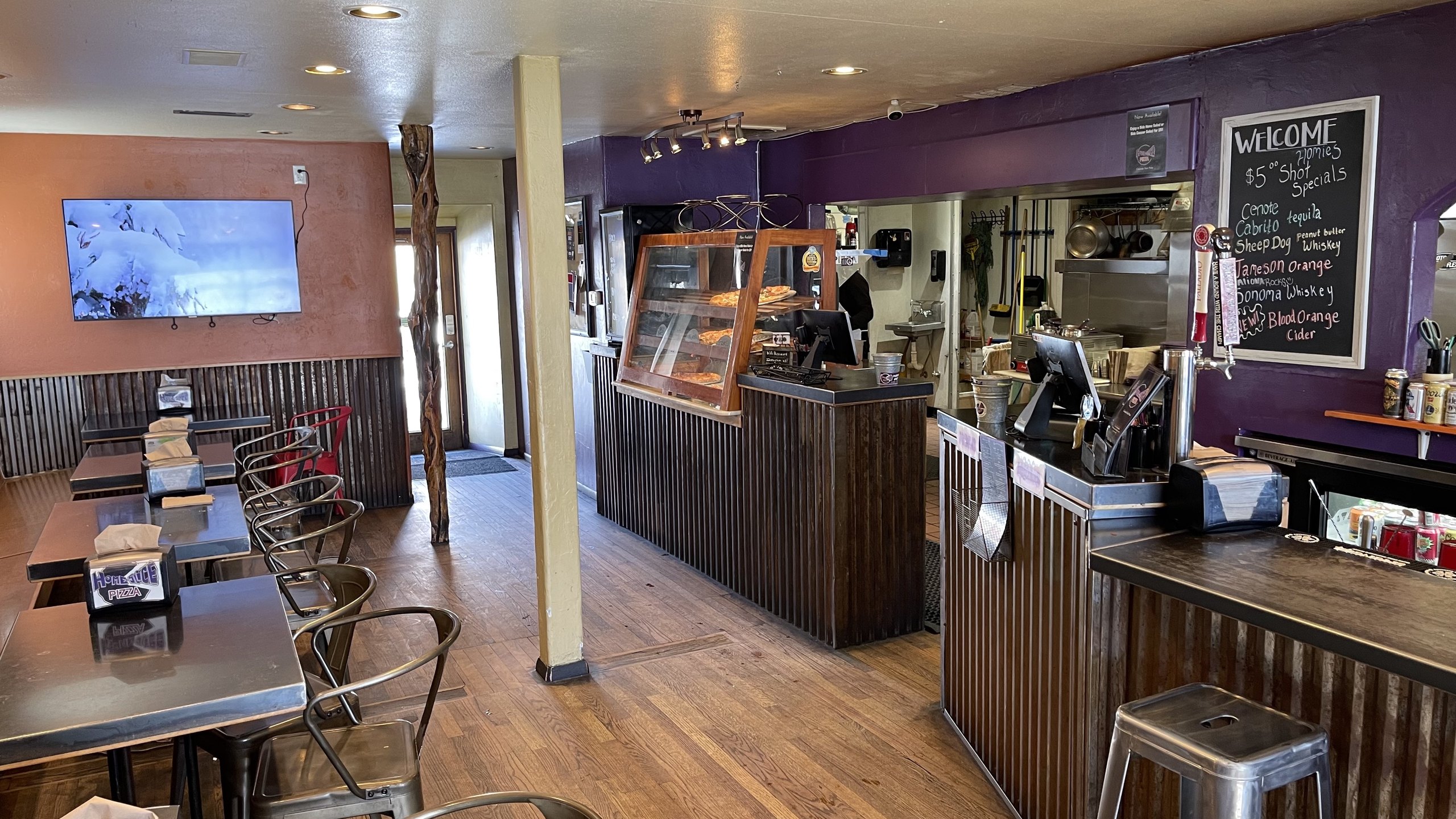 The counter at HomeSlice Pizza College Drive